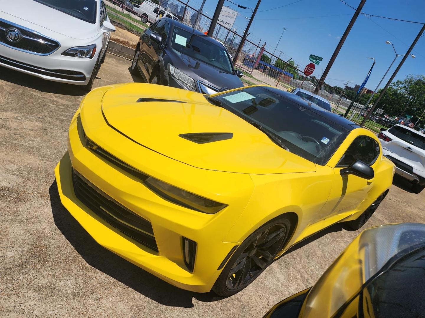 2018 Yellow /Black Chevrolet Camaro 1LT Coupe (1G1FB1RS7J0) with an 3.6L V6 DOHC 24V engine, 6A transmission, located at 945 E. Jefferson Blvd, Dallas, TX, 75203, (214) 943-7777, 32.752514, -96.811630 - Photo#0